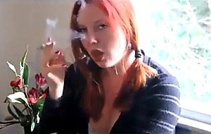 Redhead smokes 2 at once