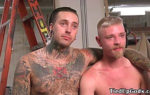 Gagged stud dicksucked by tattooed maledom