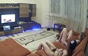 Two girls masturbating while watching porn