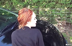 Redhead slut fucks dude with car