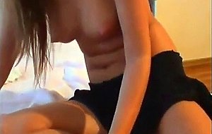 Sexy brunette on webcam fingering her tight pussy