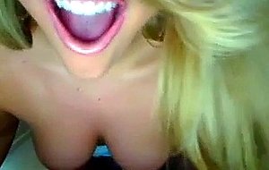 Sexy blonde feels herself up on cam