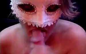 Busty masked housewife giving head