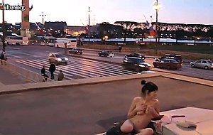 Crazy girl plays with herself in the city center  
