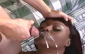 Chocolate lady eats white cock