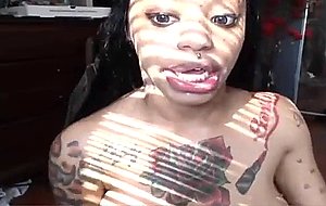 Tatted ebony sucking with fantastic boobs