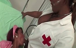 Two shemale nurses blowing each other