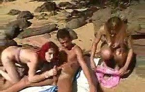 Crazy threesome on the beach