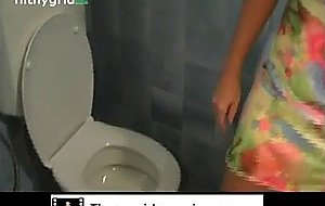 Girl pooping on the toilet  