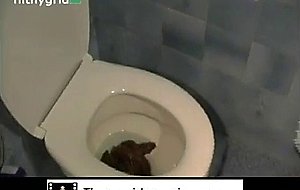 Girl pooping on the toilet  