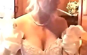 Bride nervously smoking cigarette   
