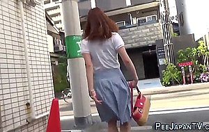 Hot asian babes peeing in public  