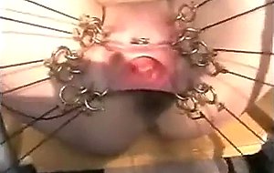 Cunt pierced and stretched repeatedly by machines 