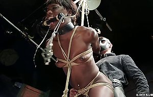 Gagged ebony slave fucked in threesome