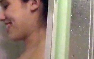 Hot girl with great tits takes a shower