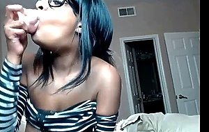 blue haired ebony pleasures dildo on webcam and loves it