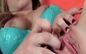 Blonde cutie rubbing her precious muff in close-up