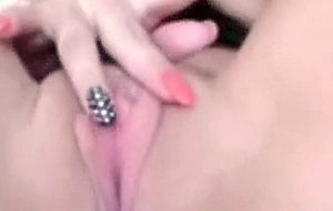 Horny chick fingering pussy