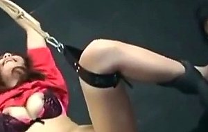 Tied asian toyed in her ass and pussy
