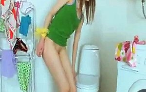 Skinny busty girl showering pussy