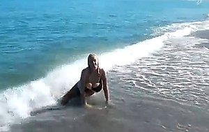 Agneti topless beach show her big boobs