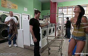 Tied brunette slut fucked in laundromat