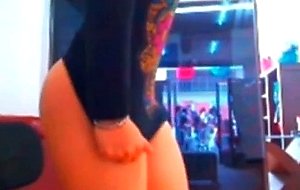 Sexy camgirl vibrator in store while people walk by 