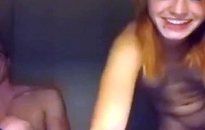 Sweet couple playing on a webcam