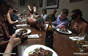 Bound slave laid on dinning table