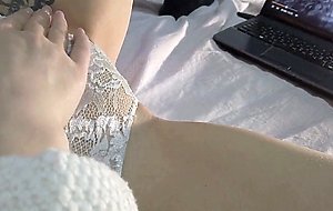 Got a real orgasm masturbating her wet pussy watching video on tube