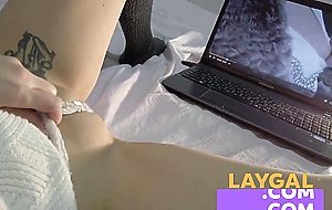 Got a real orgasm masturbating her wet pussy watching video on tube