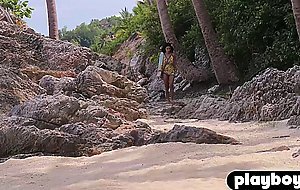 Petite Asian teen model posed on the beach and revealed her stunning body