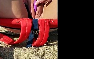 Busty fat pussy vibrating orgasm at the beach watching porn