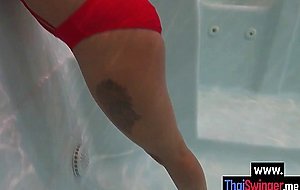 Asian teen enjoyed posing in the pool before she swallowed big hard cock