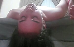 Fucking a whore's throat while she is lying upside down