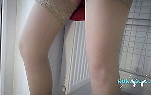 Sexy girl in stockings and boots has virtual sex through a video call