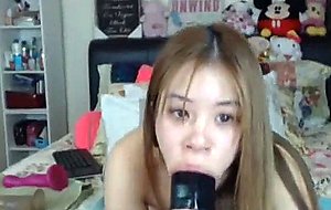 Cute Asian Plays with Huge Dildo