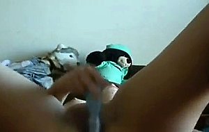 Horny girl spreads her legs for masturbating on the webcam