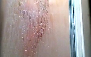Round ass milf with hairy pussy gets wet in her shower
