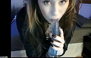 Emo girl puts vibrator in her mouth