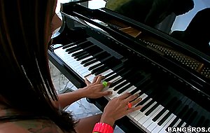 Huge titted woman Raylene plays with piano topless